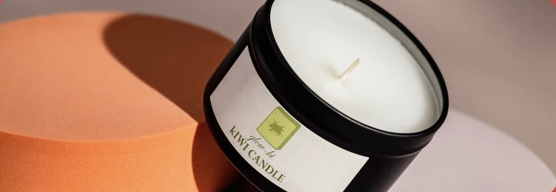 Glow-Ki kiwi candle mockup on an orange and blush studio surface