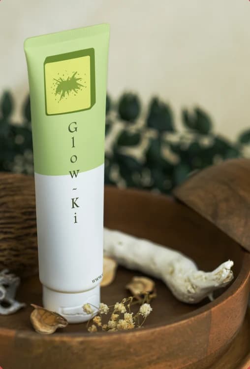 Glow-Ki skincare tube with the finished kiwi-inspired identity